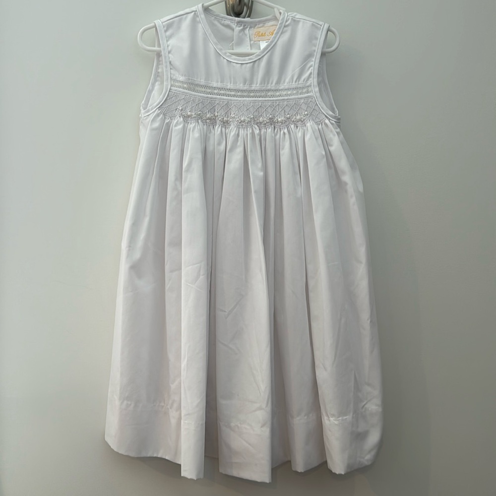 Petit Ami sleeveless white smocked dress